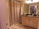 Clean bathroom with a vanity and shower/tub combo at 4751 Travini Cir # 4-108, Sarasota, FL 34235