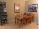 Bright dining area with a table and four chairs at 4751 Travini Cir # 4-108, Sarasota, FL 34235