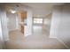 Open entryway leading to the living and kitchen area at 4751 Travini Cir # 4-108, Sarasota, FL 34235