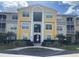 Inviting condo building with attractive landscaping and convenient entryway at 4751 Travini Cir # 4-108, Sarasota, FL 34235