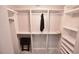 Large walk-in closet with shelving and hanging rods at 4751 Travini Cir # 4-108, Sarasota, FL 34235