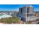 High-rise building in vibrant city setting with surrounding buildings and landscape at 50 Central Ave # 17Phc, Sarasota, FL 34236