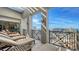 Spacious balcony with lounge chairs and panoramic city views at 50 Central Ave # 17Phc, Sarasota, FL 34236