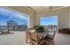 Large balcony with dining table and chairs, offering city views at 50 Central Ave # 17Phc, Sarasota, FL 34236