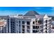 High-rise building with balconies and a unique roofline, offering city views at 50 Central Ave # 17Phc, Sarasota, FL 34236