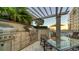 Outdoor grilling area with patio furniture and city views at 50 Central Ave # 17Phc, Sarasota, FL 34236