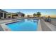 Inviting rooftop pool with surrounding lounge chairs and patio at 50 Central Ave # 17Phc, Sarasota, FL 34236