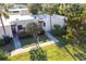 Aerial view of condo building and lush landscaping at 501 Spring Lakes Blvd # 501, Bradenton, FL 34210