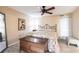 Main bedroom with a king-size bed and an antique chest at 501 Spring Lakes Blvd # 501, Bradenton, FL 34210