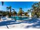 Inviting community pool with plenty of lounge chairs at 501 Spring Lakes Blvd # 501, Bradenton, FL 34210