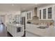 Well-equipped kitchen featuring an island, ample counter space, and stainless steel appliances at 5099 Flag St, Sarasota, FL 34232