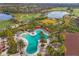 Community pool and surrounding landscape at 5116 Tivoli Run, Bradenton, FL 34211