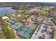 Aerial view of Esplanade's amenities including tennis courts at 5116 Tivoli Run, Bradenton, FL 34211