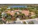 Aerial view of Esplanade Golf & Country Club, showcasing its clubhouse at 5116 Tivoli Run, Bradenton, FL 34211