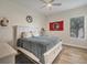 Spacious bedroom with a king-size bed and neutral color palette at 5116 Tivoli Run, Bradenton, FL 34211