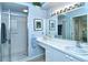 Clean bathroom with shower and white vanity at 5211 Mahogany Run Ave # 124, Sarasota, FL 34241