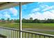 Enjoy serene golf course views from this screened balcony at 5211 Mahogany Run Ave # 124, Sarasota, FL 34241