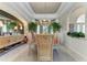 Bright dining room with a marble table and comfortable seating at 5224 88Th E St, Bradenton, FL 34211