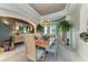 Bright dining room with a marble table and comfortable seating at 5224 88Th E St, Bradenton, FL 34211