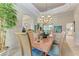 Bright dining room with a marble table and comfortable seating at 5224 88Th E St, Bradenton, FL 34211