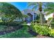 Elegant home entrance with landscaped walkway at 5224 88Th E St, Bradenton, FL 34211