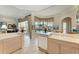 Kitchen with white appliances and light wood cabinets at 5224 88Th E St, Bradenton, FL 34211