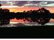 Stunning sunset view over a serene lake at 5224 88Th E St, Bradenton, FL 34211