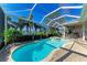 Inviting freeform pool and spa with screened enclosure at 5224 88Th E St, Bradenton, FL 34211