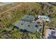 Aerial view of community tennis courts and swimming pool at 5224 88Th E St, Bradenton, FL 34211