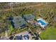 Aerial view of community tennis courts and swimming pool at 5224 88Th E St, Bradenton, FL 34211