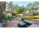 Spacious patio with seating area and lush landscaping at 5348 Royal Palm Ave # 5348, Sarasota, FL 34234