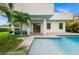 Modern home with a refreshing pool and patio furniture at 5351 Moeller Ave, Sarasota, FL 34233