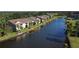 Aerial view of community featuring canal front homes at 5360 Hyland Hills Ave # 2622, Sarasota, FL 34241