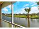 Peaceful screened-in patio with lake and golf course view at 5360 Hyland Hills Ave # 2622, Sarasota, FL 34241