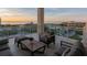 Relaxing balcony with outdoor seating and bay views at 540 N Tamiami Trl # 802, Sarasota, FL 34236