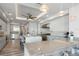 Modern kitchen with stainless steel appliances and large island at 540 N Tamiami Trl # 802, Sarasota, FL 34236