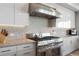 Stainless steel range and built-in microwave in modern kitchen at 540 N Tamiami Trl # 802, Sarasota, FL 34236