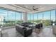 Spacious living area with water views and comfortable seating at 540 N Tamiami Trl # 802, Sarasota, FL 34236