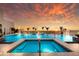 Resort-style pool and hot tub with sunset views at 540 N Tamiami Trl # 802, Sarasota, FL 34236