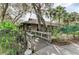 Wooden walkway leading to the community clubhouse at 5655 Pipers Waite # 27, Sarasota, FL 34235