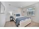 Bright bedroom with a queen-size bed and a window at 567 Venice Ln, Sarasota, FL 34242