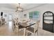 Elegant dining area featuring a wood table and comfortable seating at 567 Venice Ln, Sarasota, FL 34242