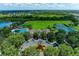 Aerial view of community amenities including pool, tennis courts, and clubhouse at 5811 100Th E Ave, Parrish, FL 34219