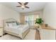 Bright bedroom with a ceiling fan and large windows at 5811 100Th E Ave, Parrish, FL 34219