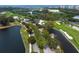 Aerial view of the golf course community and waterway at 601 Weston Pointe Ct, Longboat Key, FL 34228