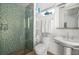 Modern bathroom with walk-in shower and mosaic tile at 601 Weston Pointe Ct, Longboat Key, FL 34228