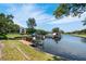 Private dock with boat slips and access to the water at 601 Weston Pointe Ct, Longboat Key, FL 34228