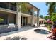 Relaxing hot tub with outdoor kitchen and beautiful landscaping at 601 Weston Pointe Ct, Longboat Key, FL 34228