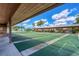 Well-maintained shuffleboard courts with shade cover in a beautiful outdoor community at 603 Chestnut Ln # 90, Englewood, FL 34223