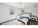 Main bedroom with queen bed and window at 609 10Th E Ave, Bradenton, FL 34208